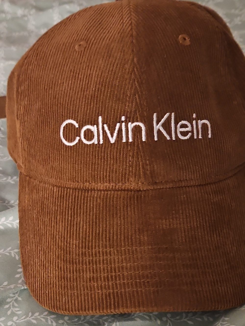 Calvin Klein Corduroy Cap in Chestnut Brown with White Script